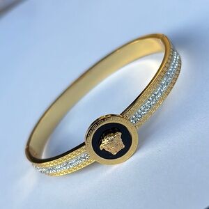 Gold and Black Bracelet with Sophisticated Charm